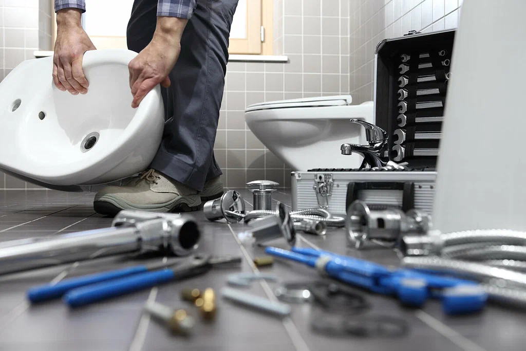 Plumbing tools prepared for a bathroom repair in Lake Worth Beach